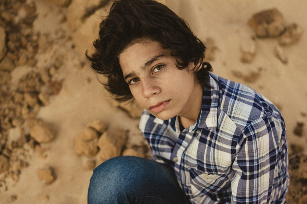 Brazilian man listening attentively with focused expression